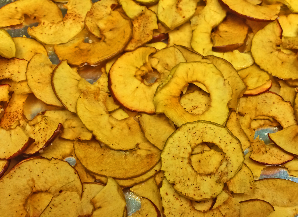 Baked Apple Crisps on a baking sheet.