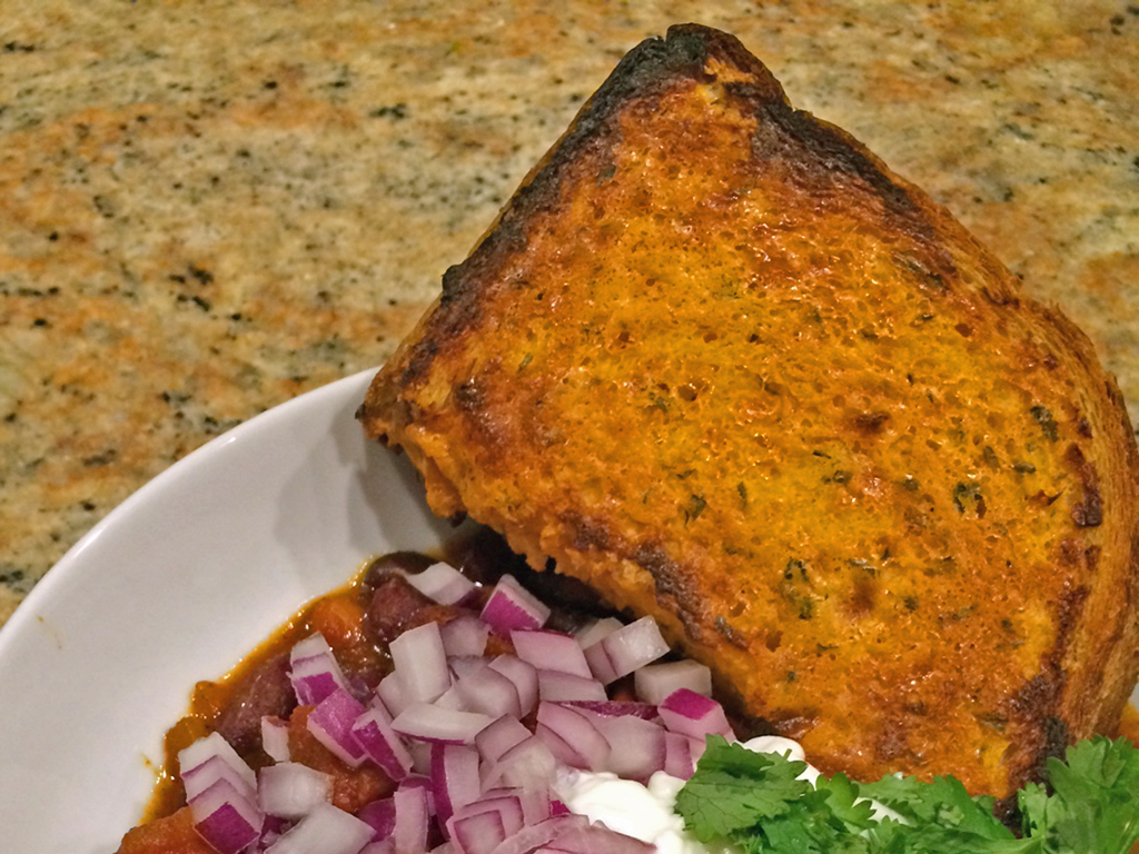 Creamy sriracha garlic bread, toasted.