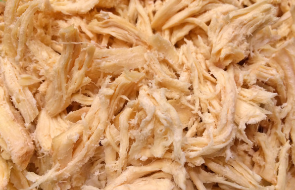 Simple shredded chicken, close up.