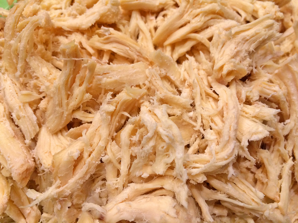 Simple shredded chicken, close up.