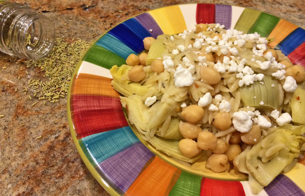 Artichoke and Chickpea pasta bake with lemon, rosemary. and goat cheese.