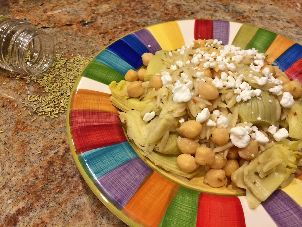 Artichoke and Chickpea pasta bake with lemon, rosemary. and goat cheese.