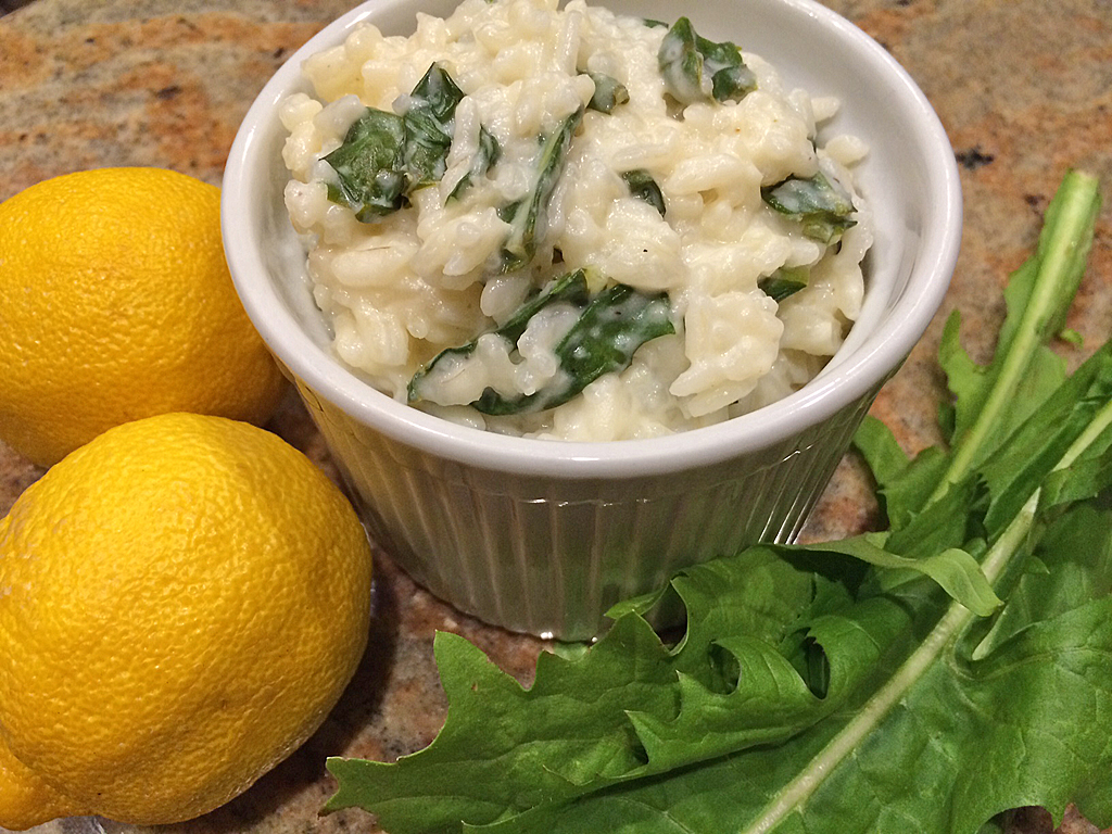 Lemon and goat cheese risotto with greens.