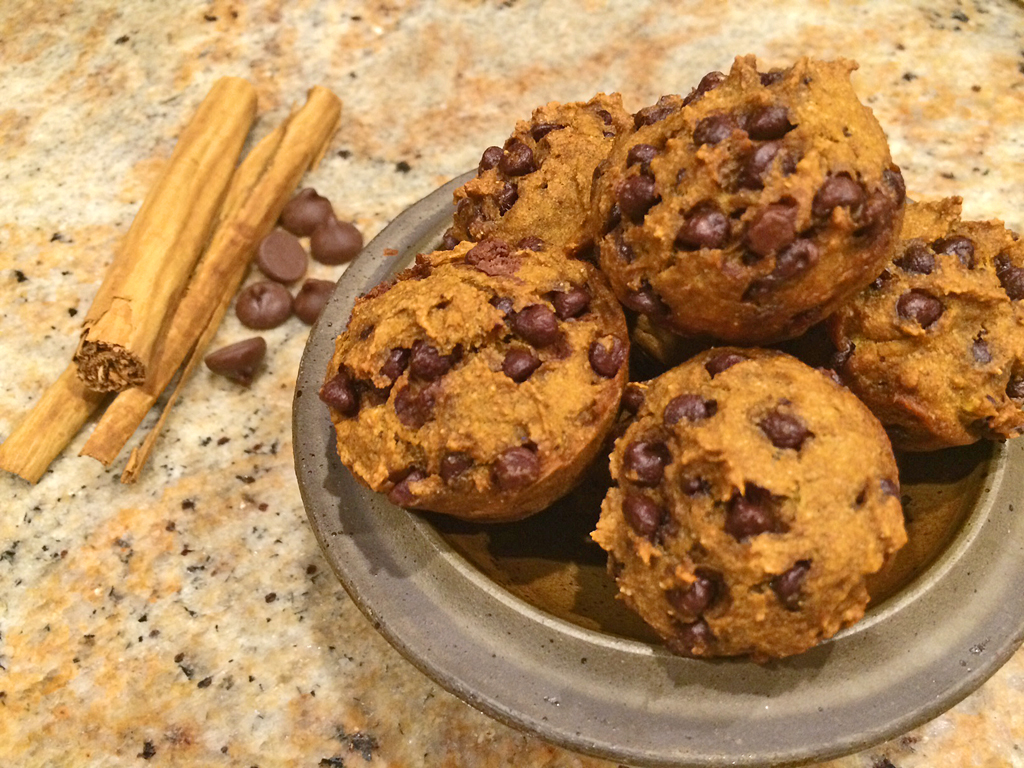 Pumpkin and chocolate chip muffins with cinnamon.