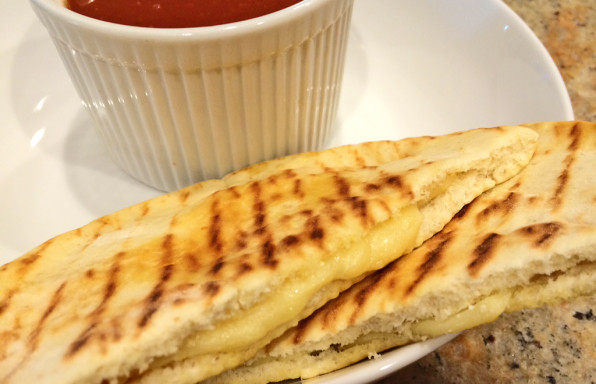 Pocket Bread Grilled Cheese with pita, cheese, and tomato soup.
