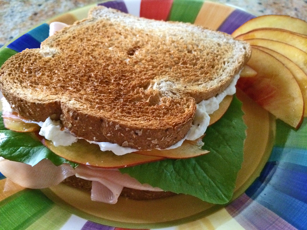 turkey and cream cheese sandwich with nectarines