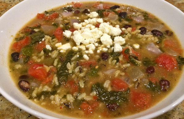 Black beans and wild rice soup with tomatoes and feta cheese.
