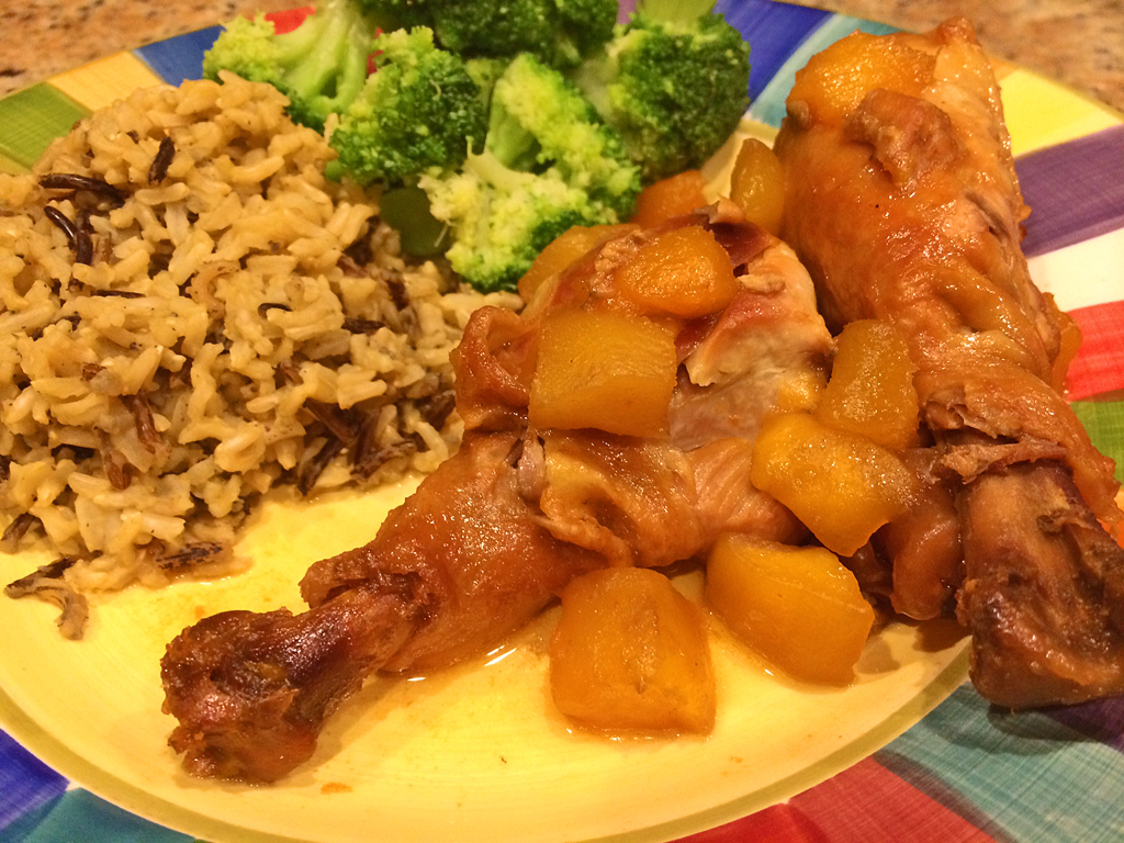 Chicken Legs in Crock Pot with Honey Sriracha and wild rice.